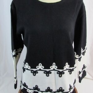 Elegant Black and White Crew Neck Sweater